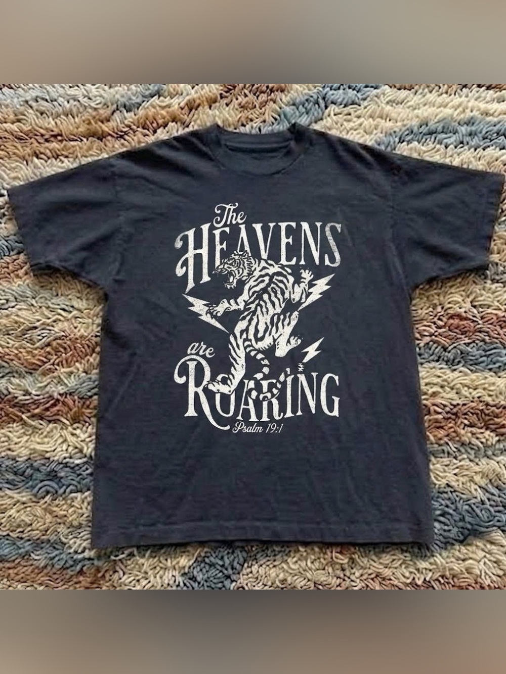 Vintage Black Graphic Tee with White Tiger & 'The Heavens Are Roaring' Text